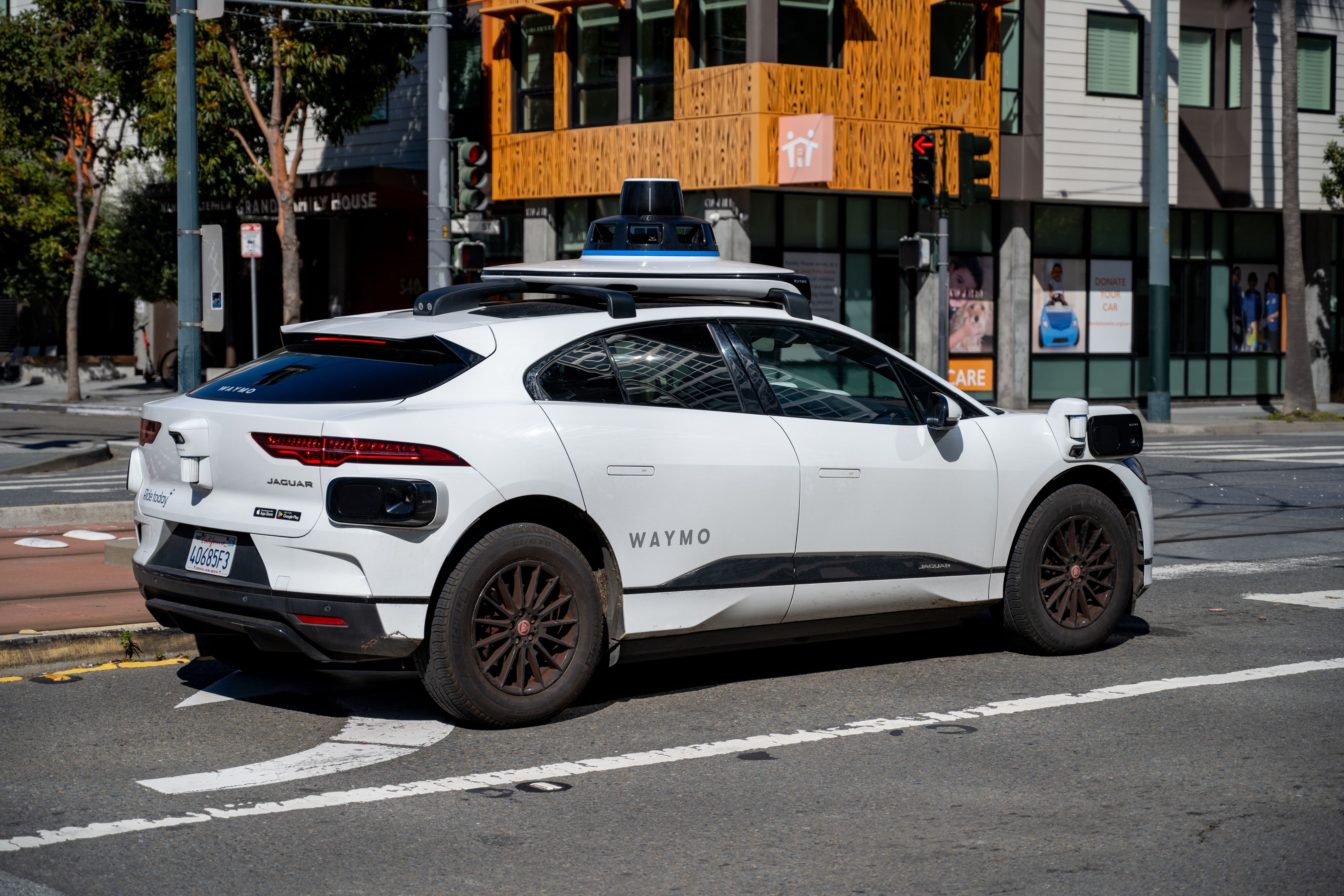 Waymo self driving car waiting at a city intersection, San Francisco, California, March 18, 2025. (Photo by Smith Collection/Gado/Getty Images)