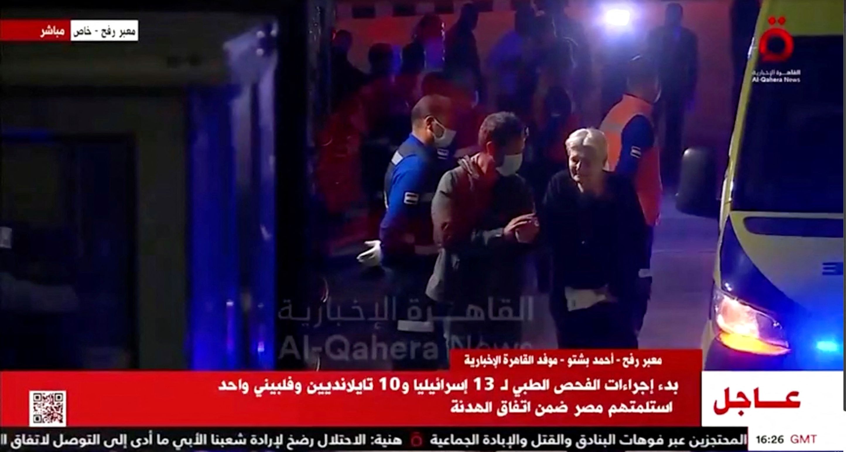  Released hostages disembark from vehicles, as a convoy of vehicles carrying hostages abducted by Hamas militants during the October 7 attack on Israel arrives through the border crossing with Gaza, amid a hostages-prisoners swap deal between Hamas and Israel, in Egypt November 24, 2023.