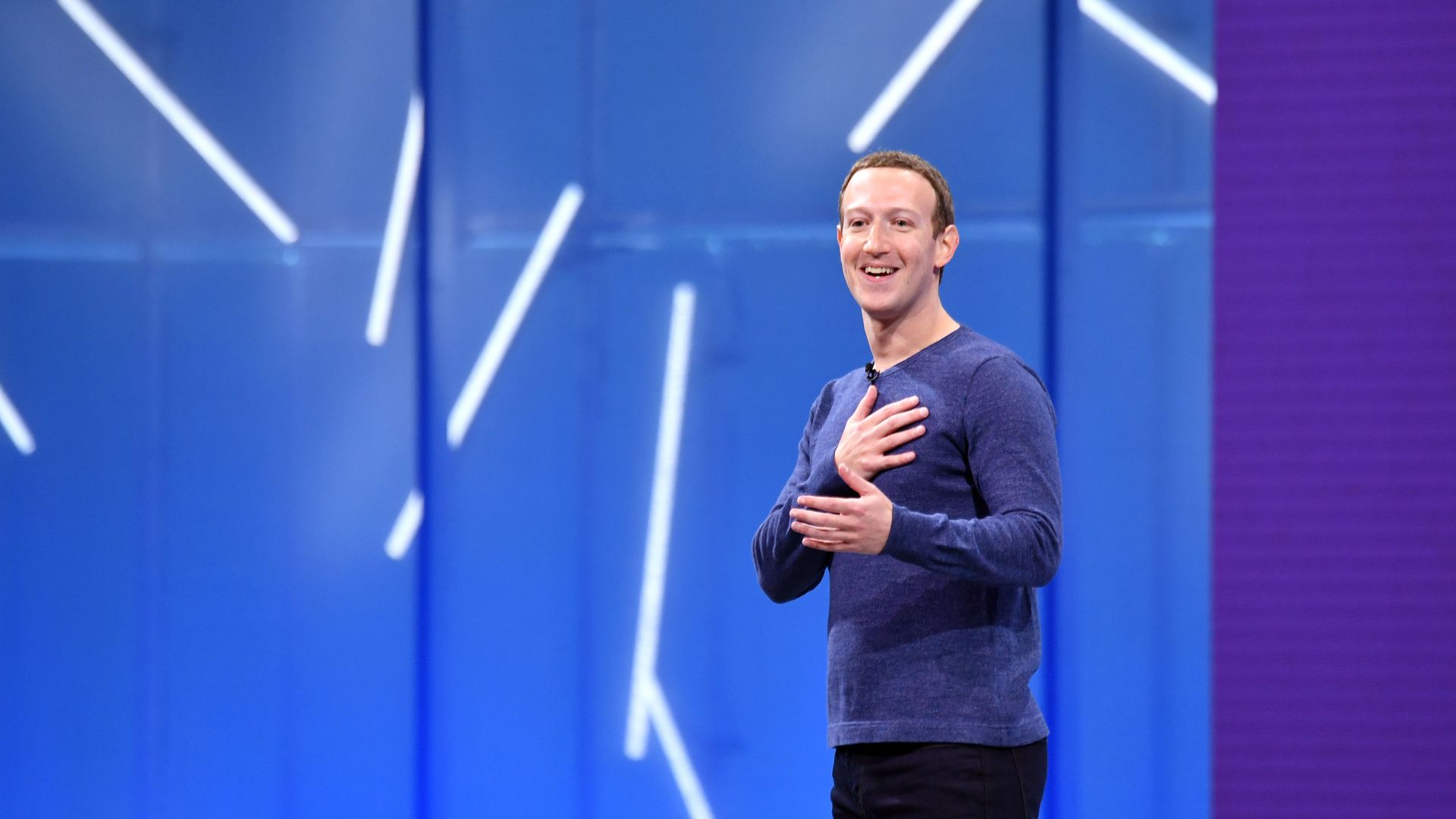 Facebook CEO Mark Zuckerberg with hand on his heart