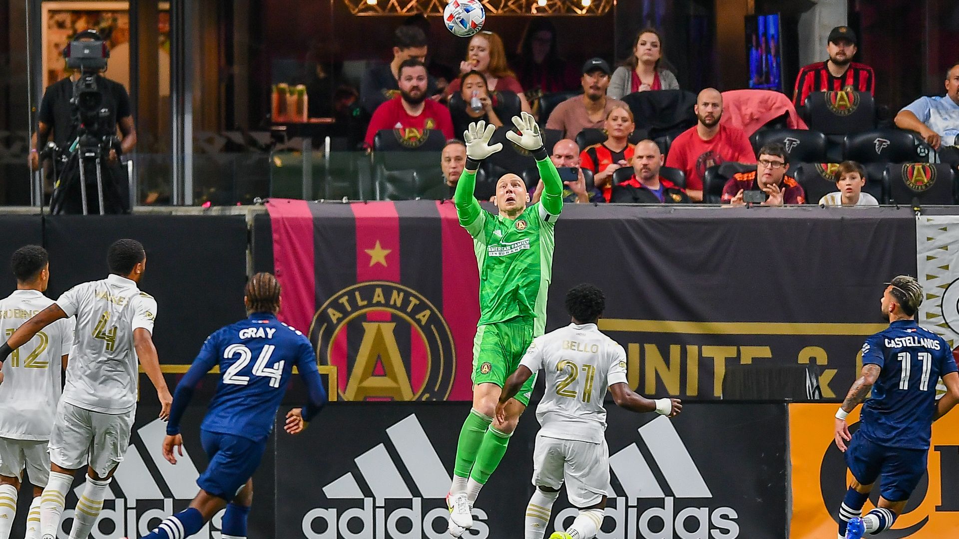 Atlanta United FC goalkeeper Brad Guzan jumps to make a save during a match against NYCFC.