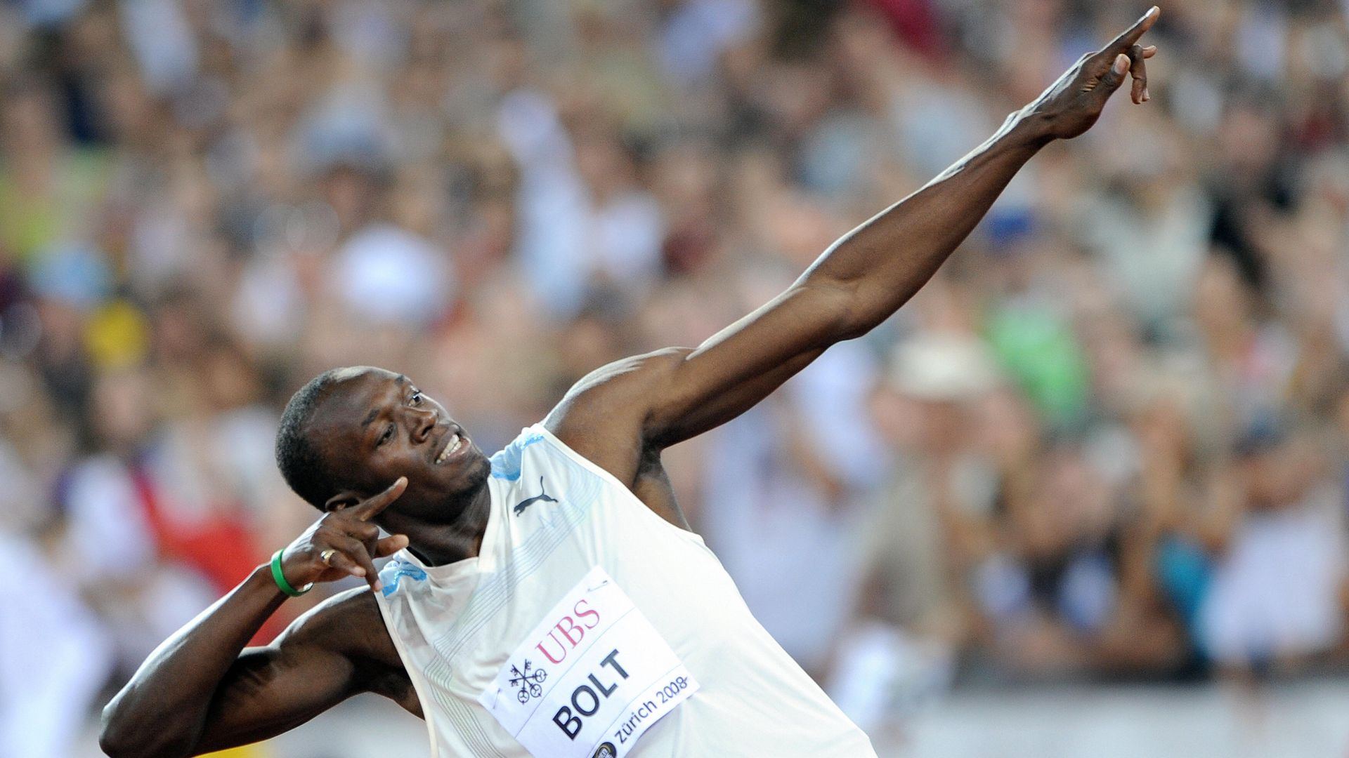 Usain Bolt celebrating after winning a 100-meters sprint in Zurich in 2008.