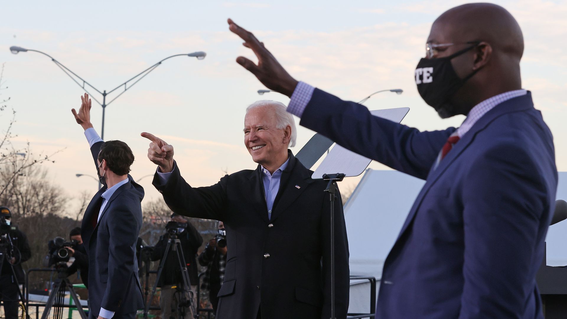 Joe Biden, Jon Ossoff, Raphael Warnock wave