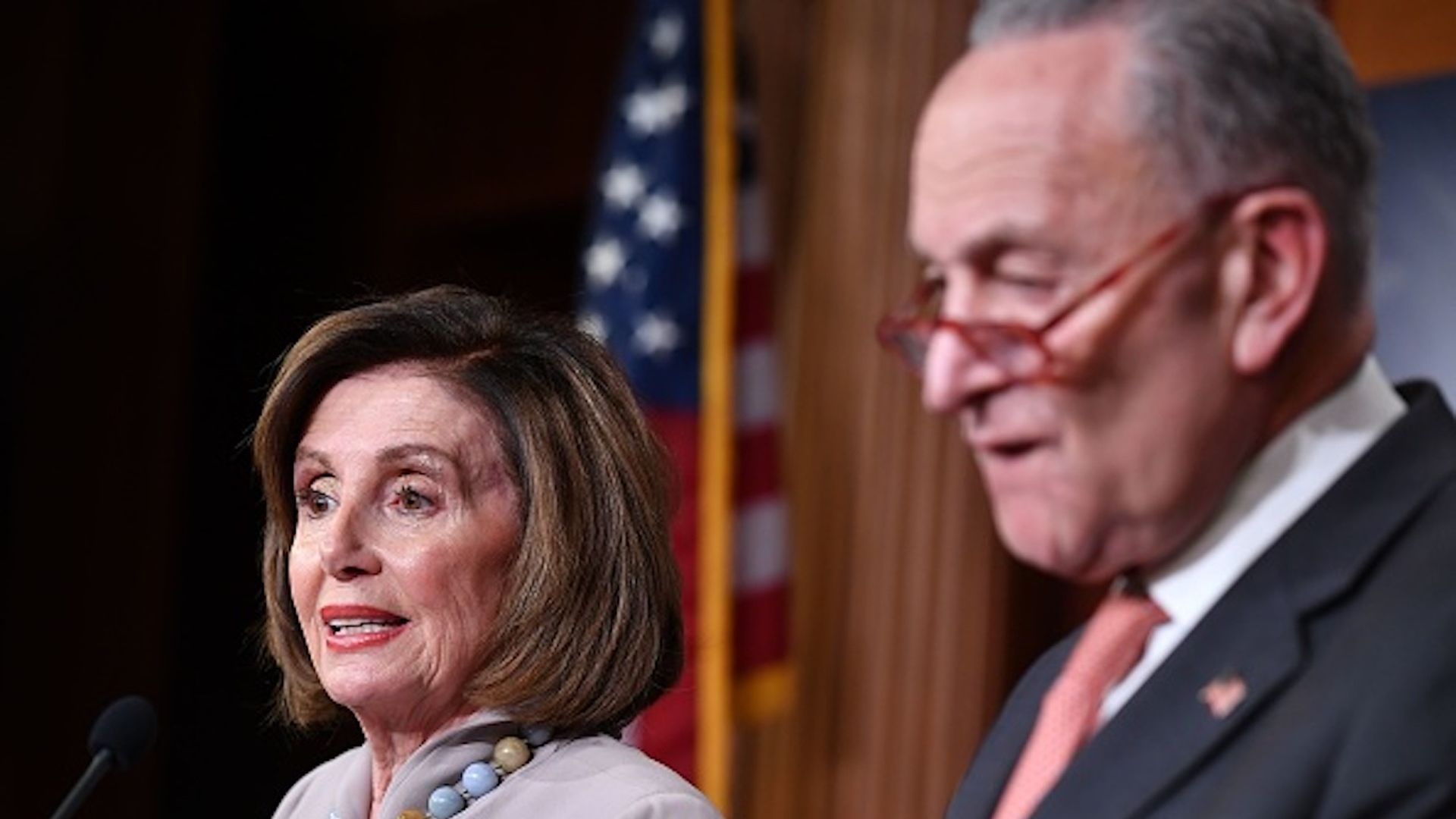 Speaker of the House Nancy Pelosi and Senate Minority Leader Chuck Schumer speaking at a press conference