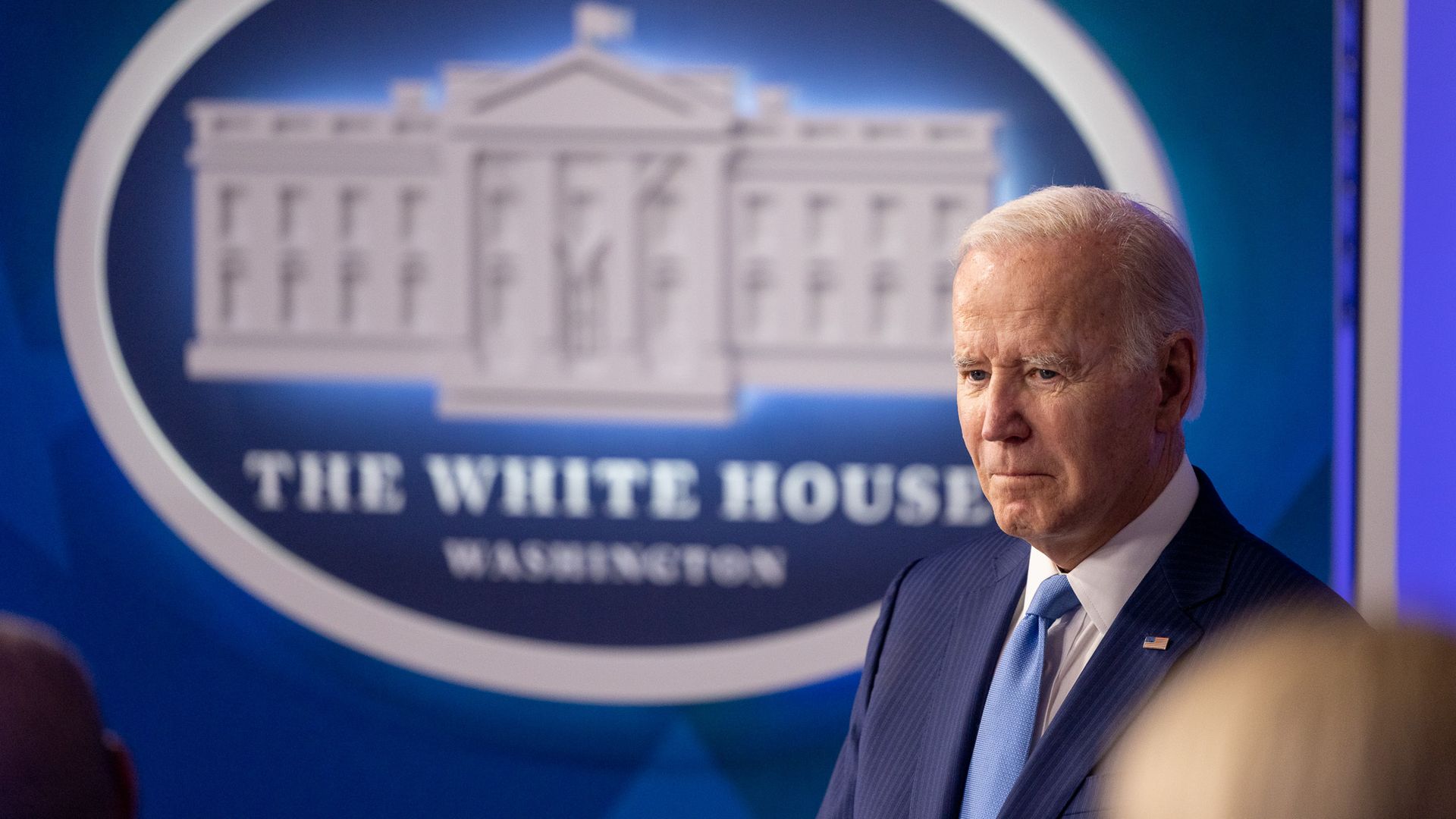 President Joe Biden waits to deliver remarks.