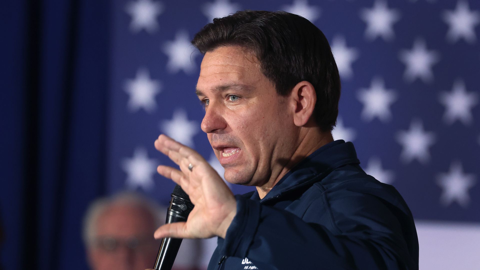 Republican presidential candidate Florida Governor Ron DeSantis speaks to guests during a campaign rally at the Thunderdome on December 02, 2023 in Newton, Iowa