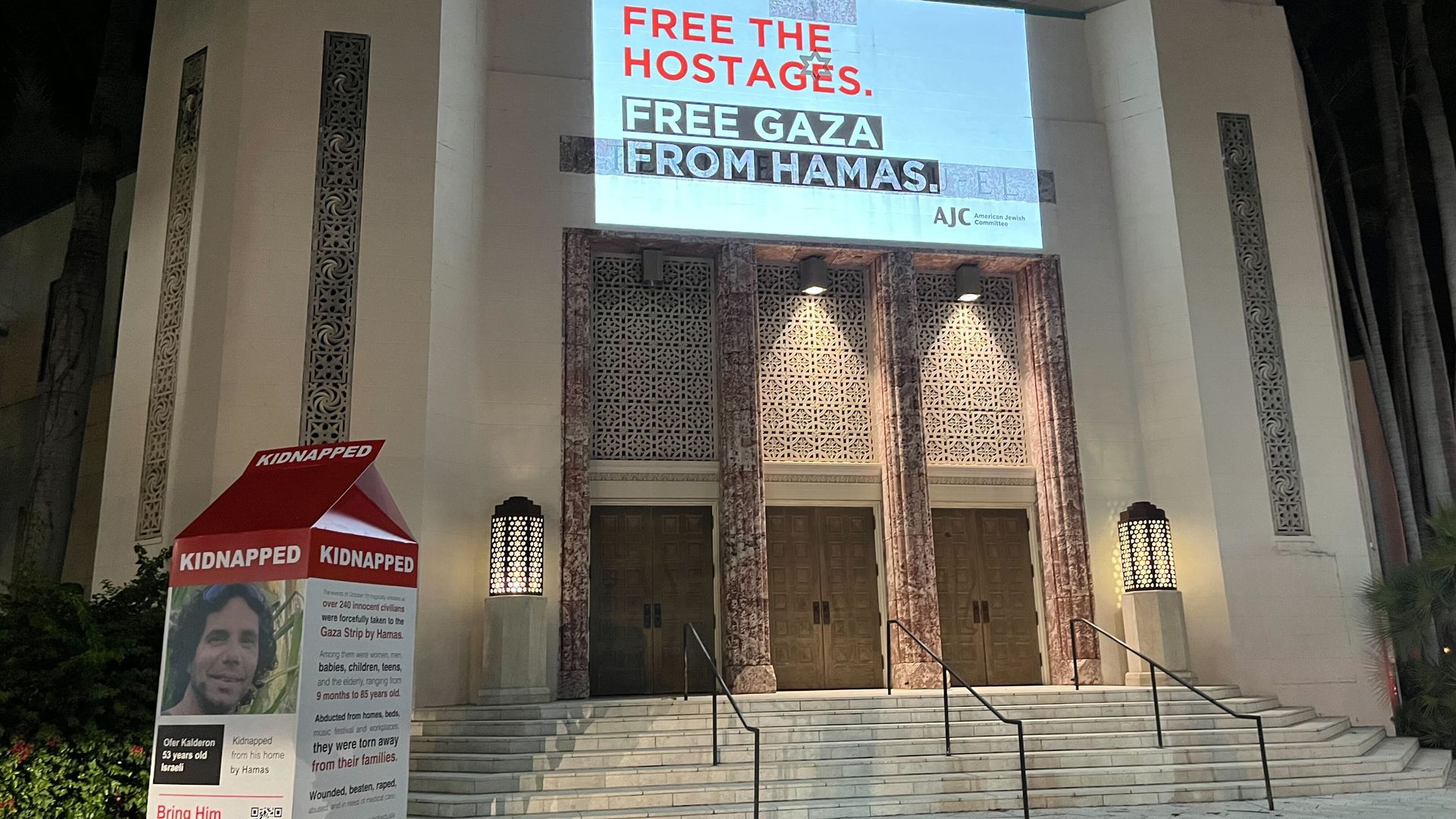 free the hostages. free gaza from hamas sign on temple with a poster of kidnapped israelis
