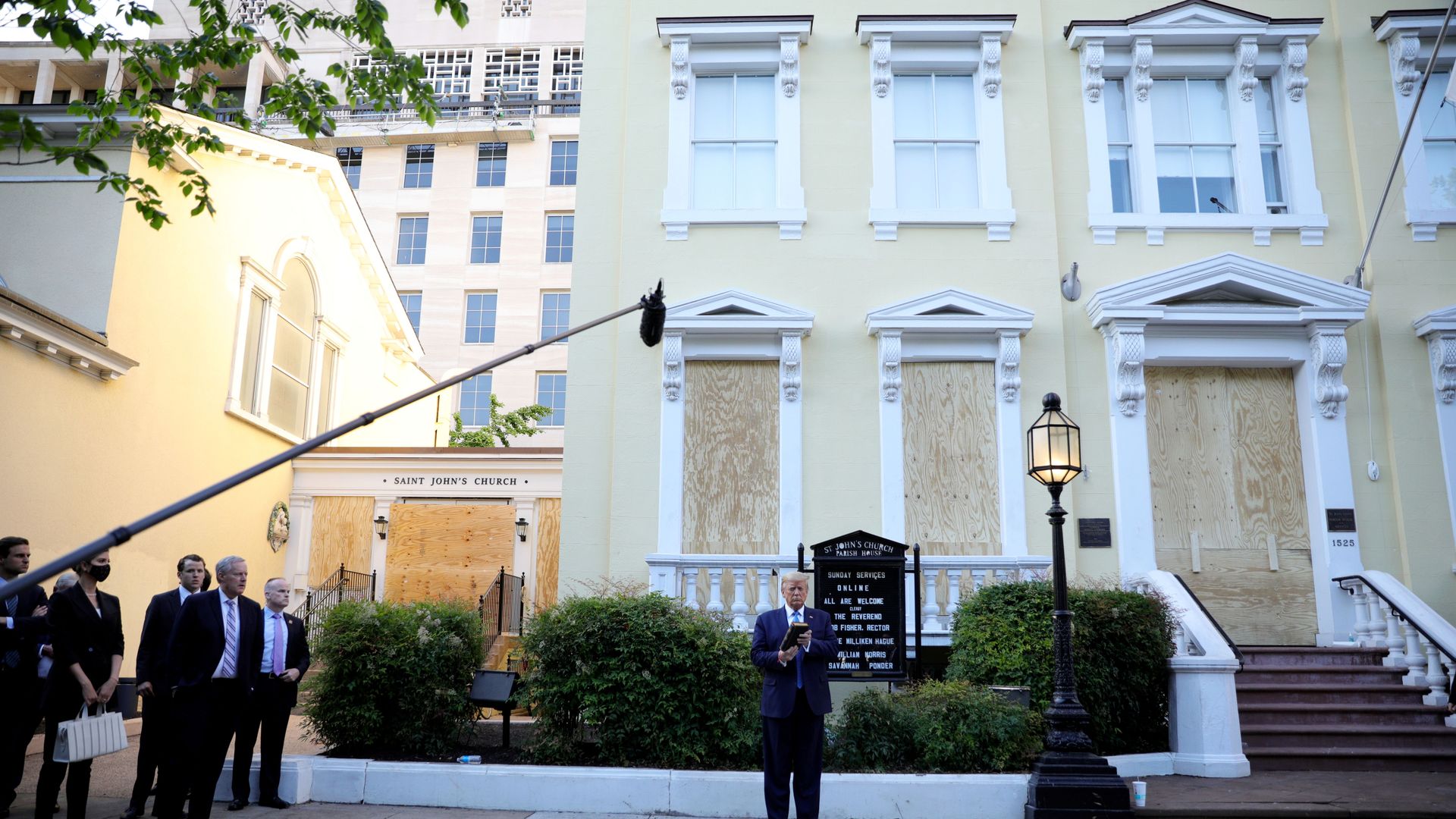 Trump talking in front of St. John's Church after riot cops cleared a path with tear gas.