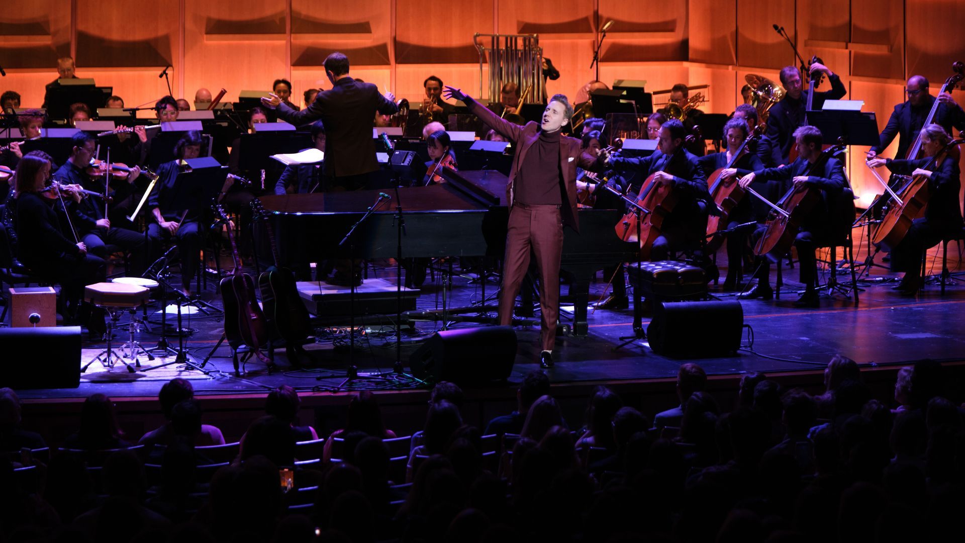 An orchestra on a stage.