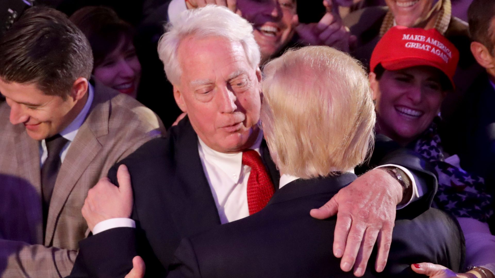 Republican president-elect Donald Trump hugs his brother Robert Trump after delivering his acceptance speech at the New York Hilton