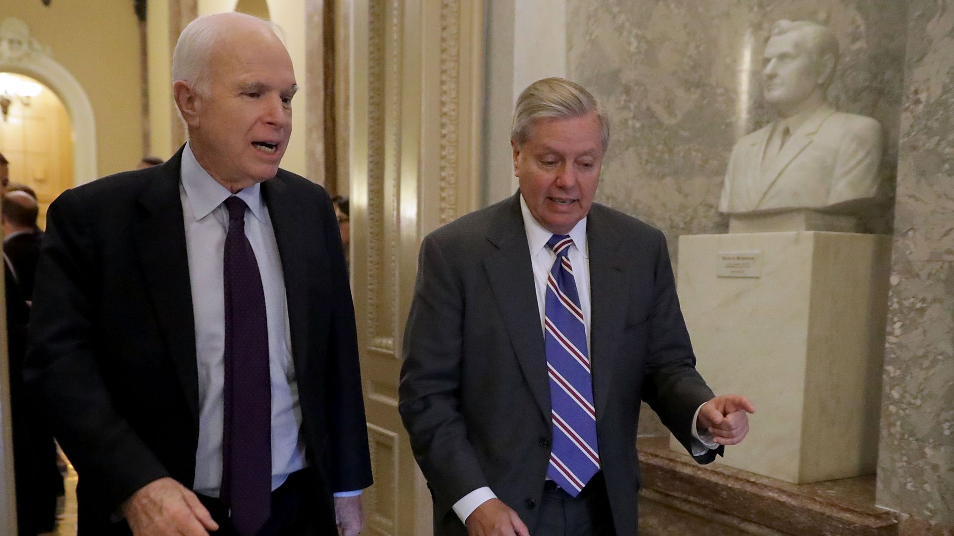 McCain and Graham walk and talk.