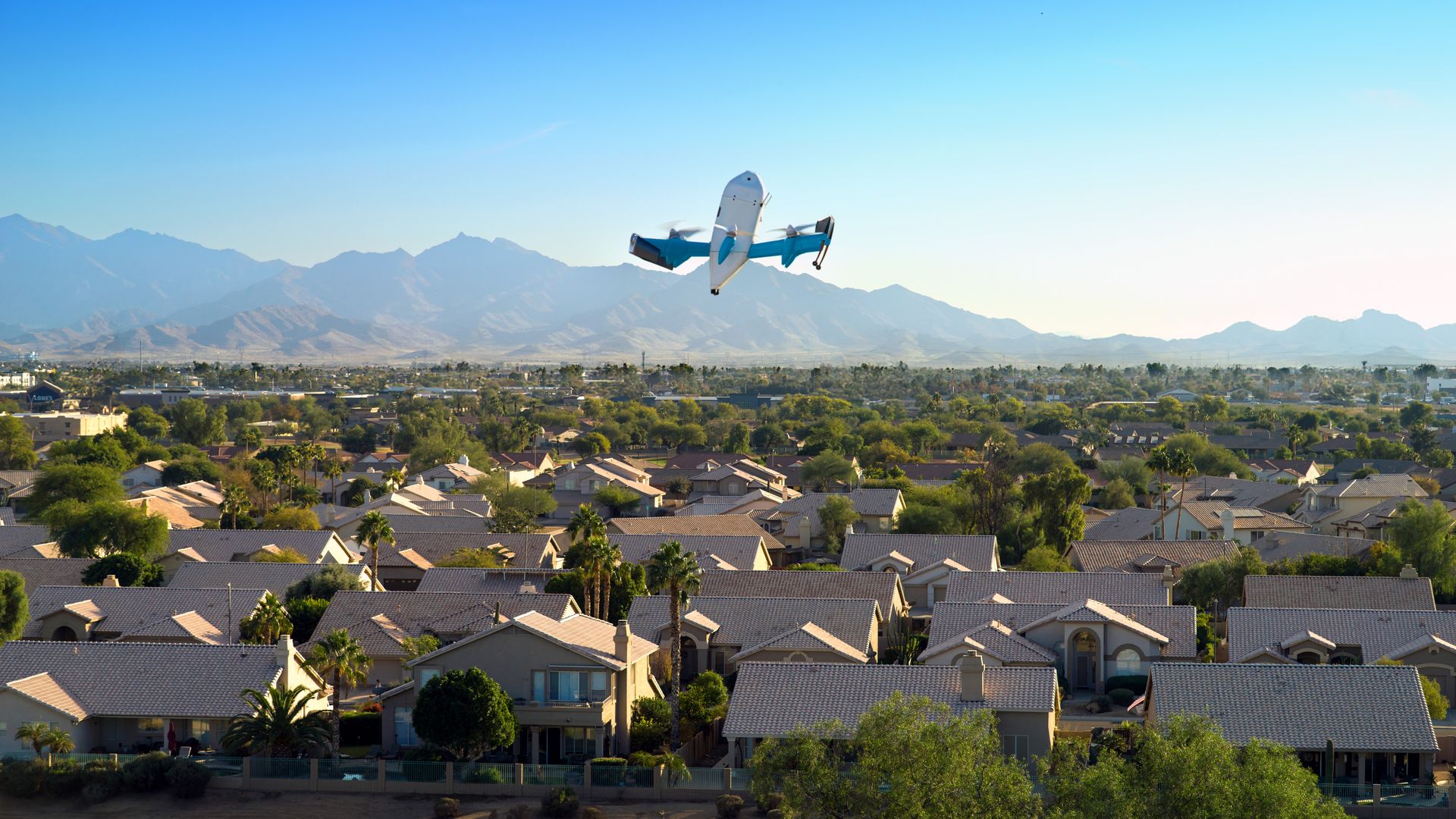 A drone flying over generic homes.