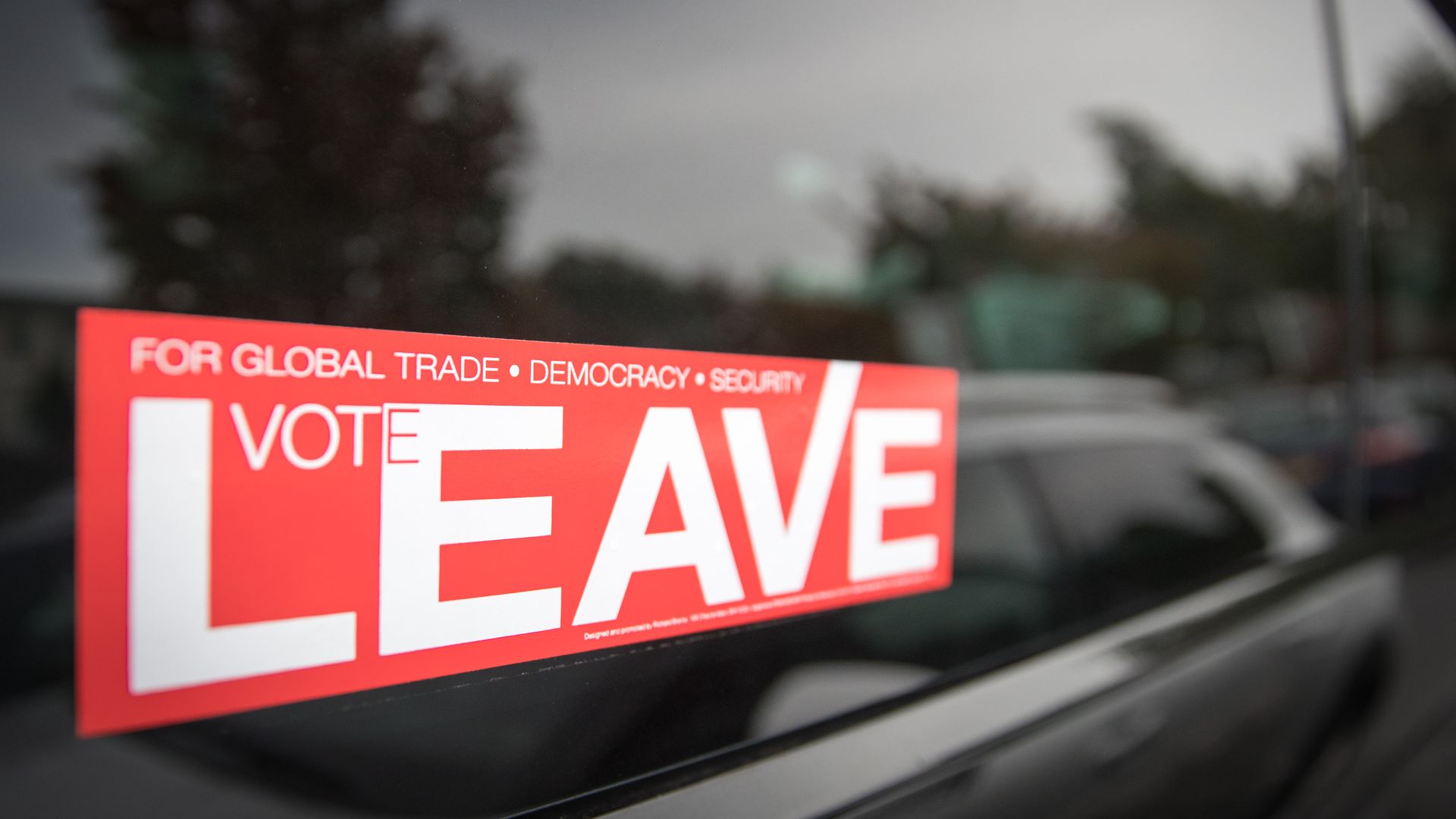A pro-Brexit sticker reads "Vote Leave"