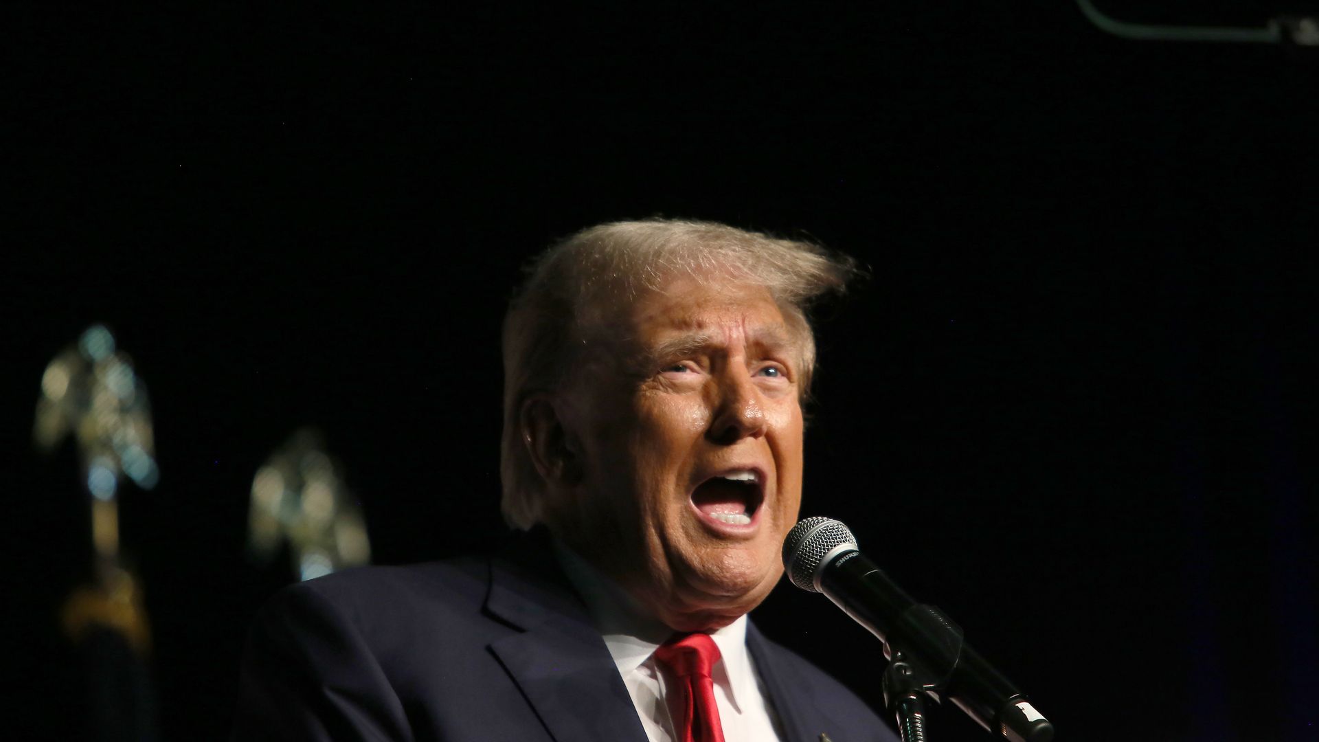 Donald Trump delivers remarks at a rally hosted by Club 47 USA at the Palm Beach County Convention Center on October 11,