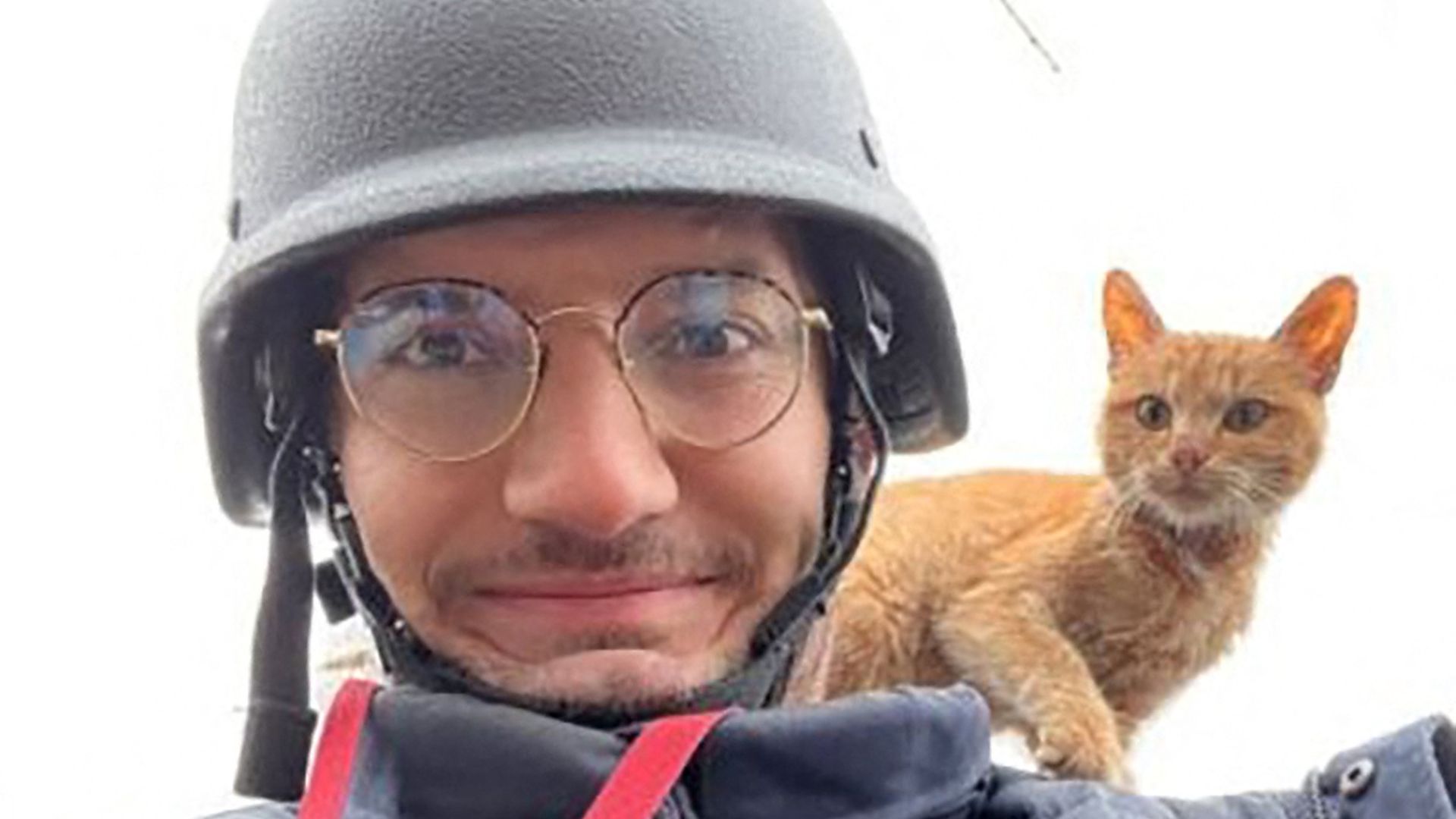 AFP journalist Arman Soldin snaps a selfie with a cat on his shoulder during an assignment for AFP in Ukraine. 