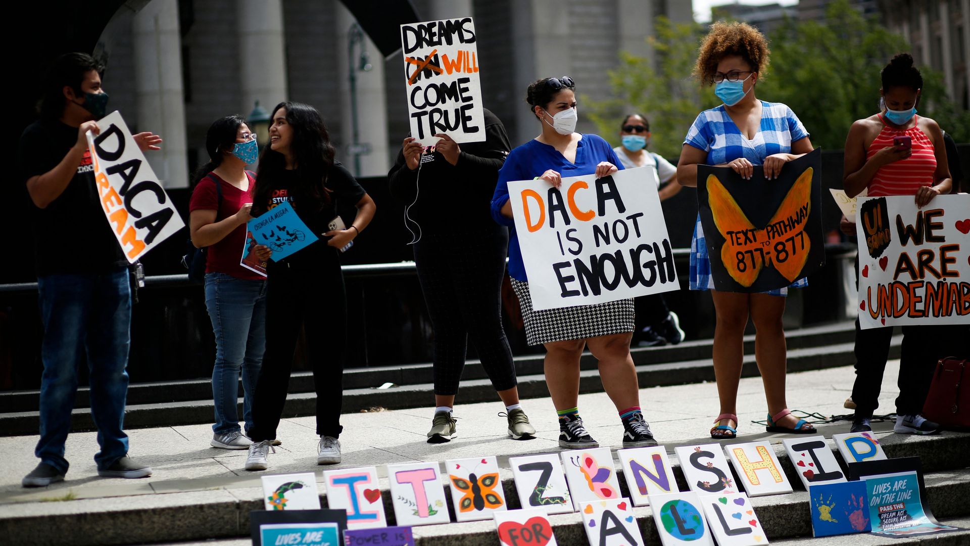 picture of a pro-immigration protest, they have signs that read "citizenship for all"