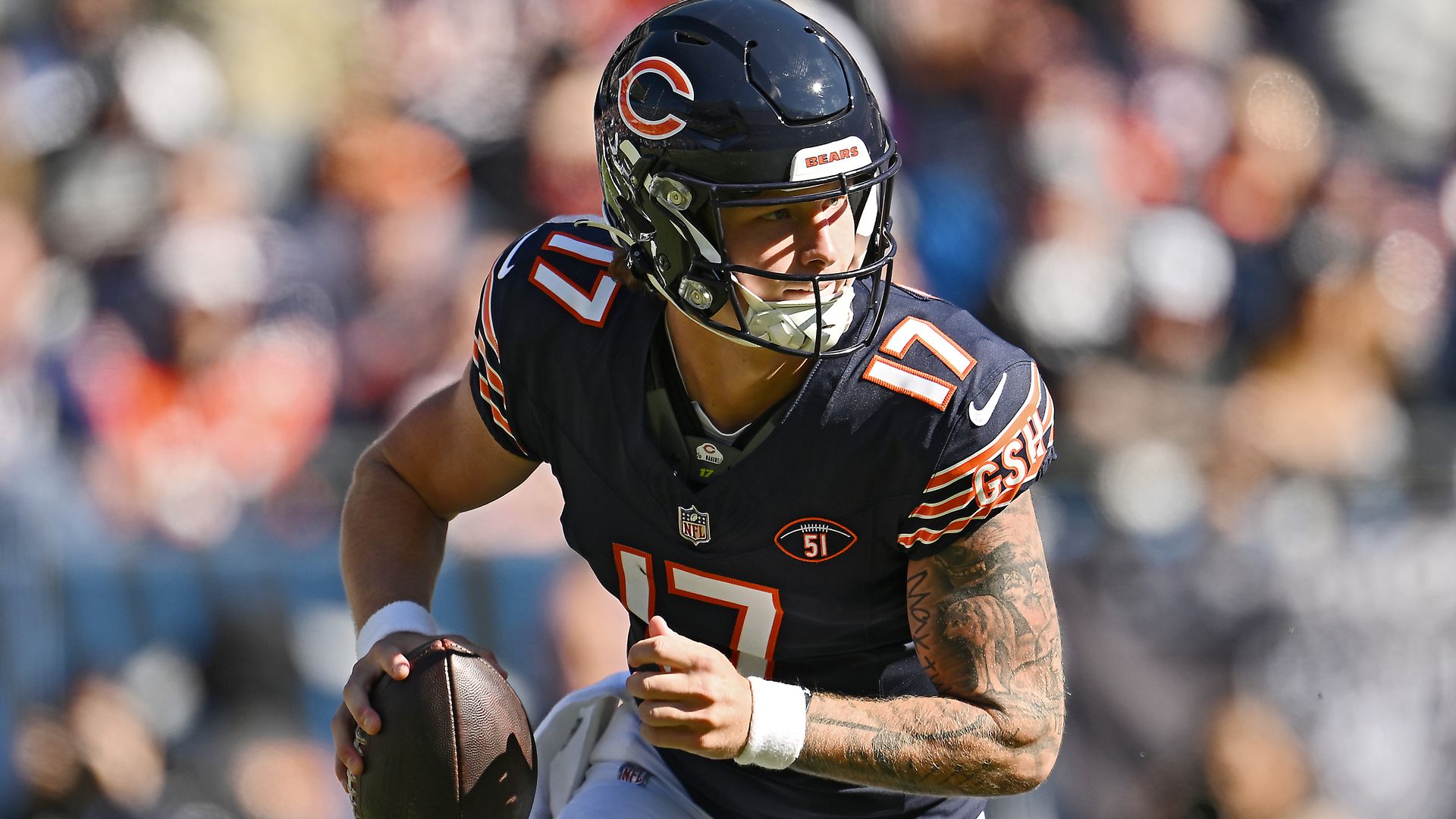 Photo of a football player with a football