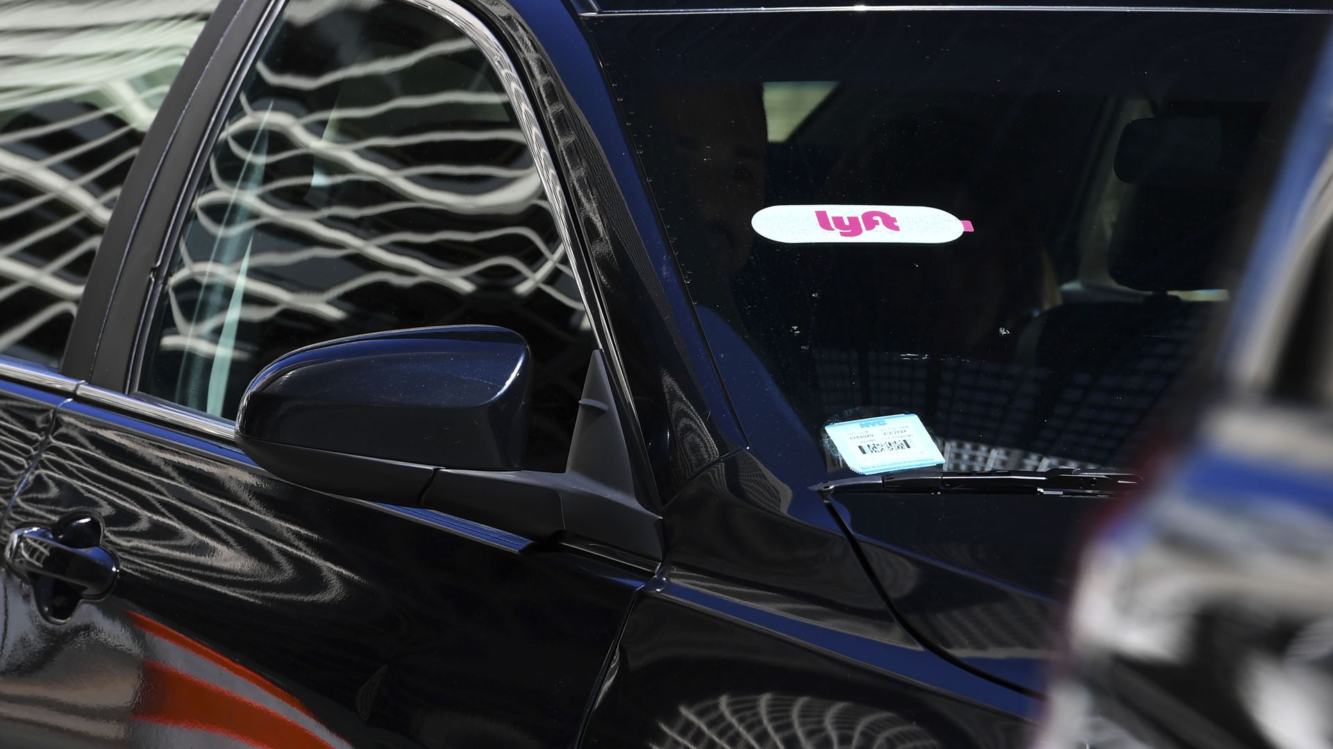 Photo of Lyft ride-hailing car on New York street.