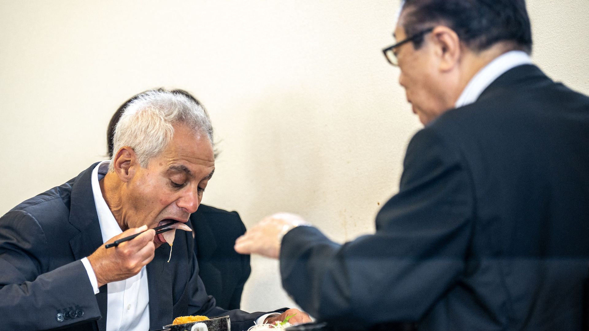 U.S. Ambassador to Japan Rahm Emanuel eating Japanese seafood