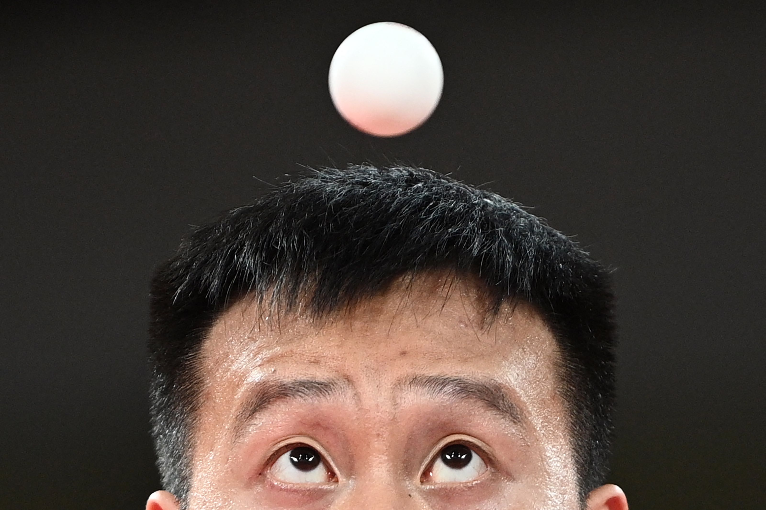 Slovakia's Yang Wang competes against Australia's Dave Powell during his men's singles round 2 table tennis match at the Tokyo Metropolitan Gymnasium during the Tokyo 2020 Olympic Games on July 26