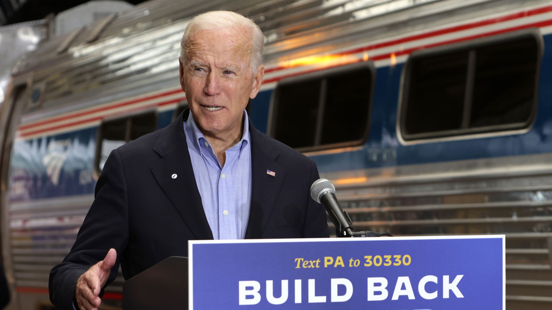 Joe Biden speaks behind a "Build Back Better" sign in Pittsburgh