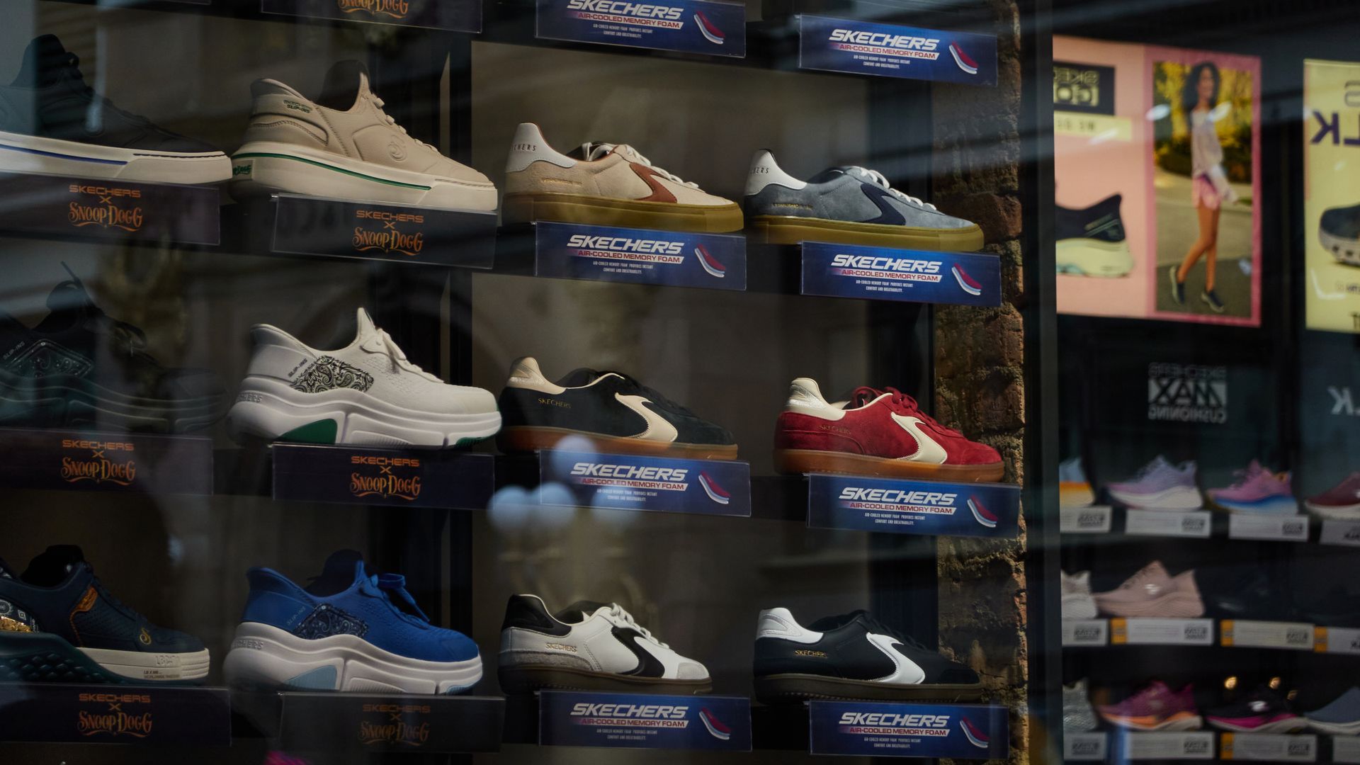 Shoes hanging on a wall at a shoe store