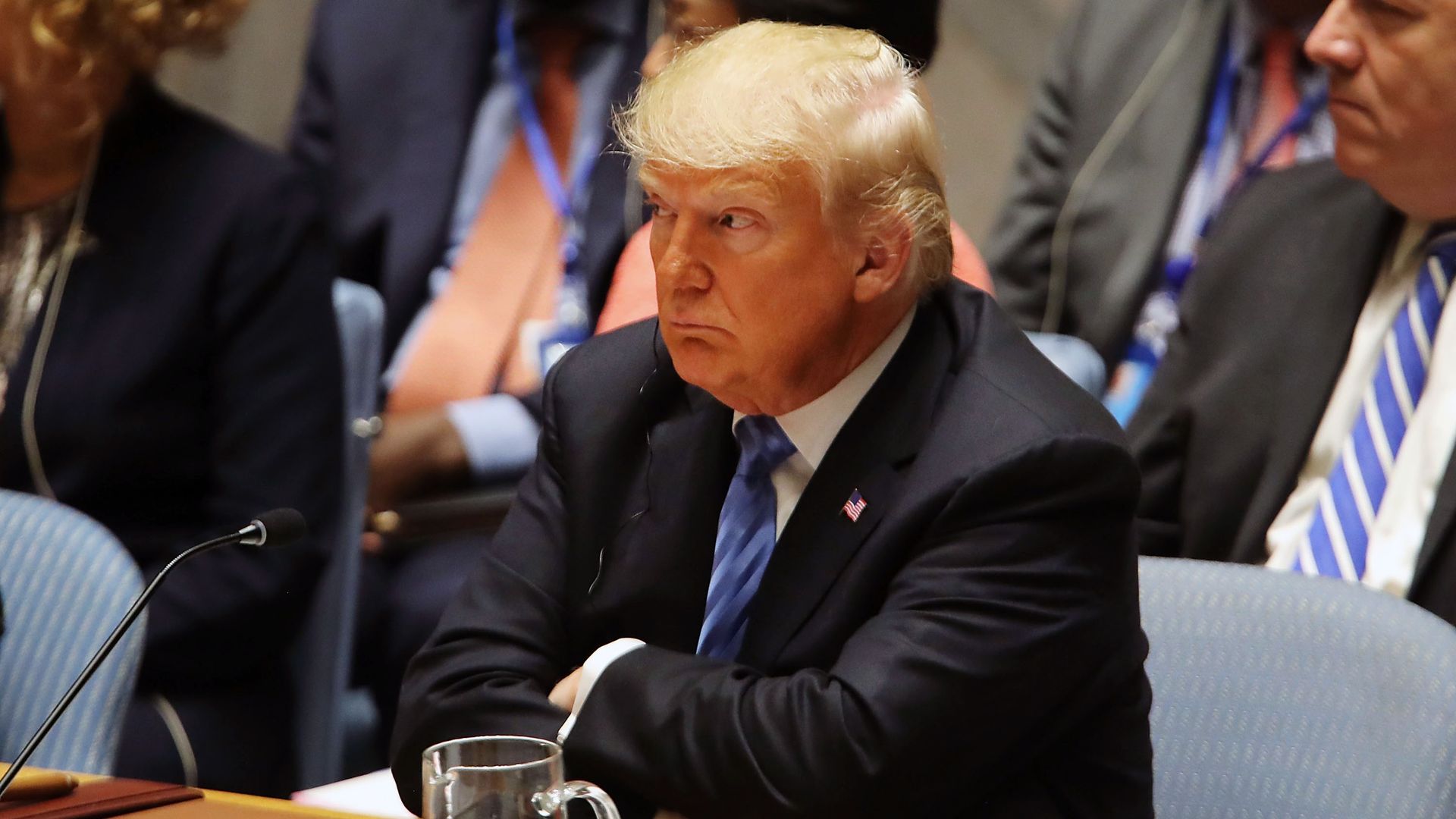 Donald Trump sitting with arms crossed at the table during UN Security Council meeting
