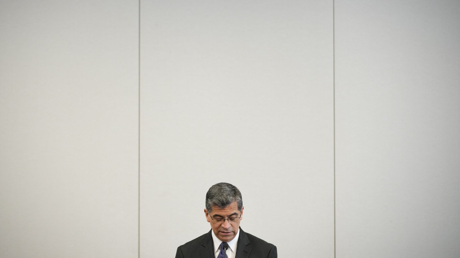 Health and Human Services Secretary Xavier Becerra is seen making remarks.