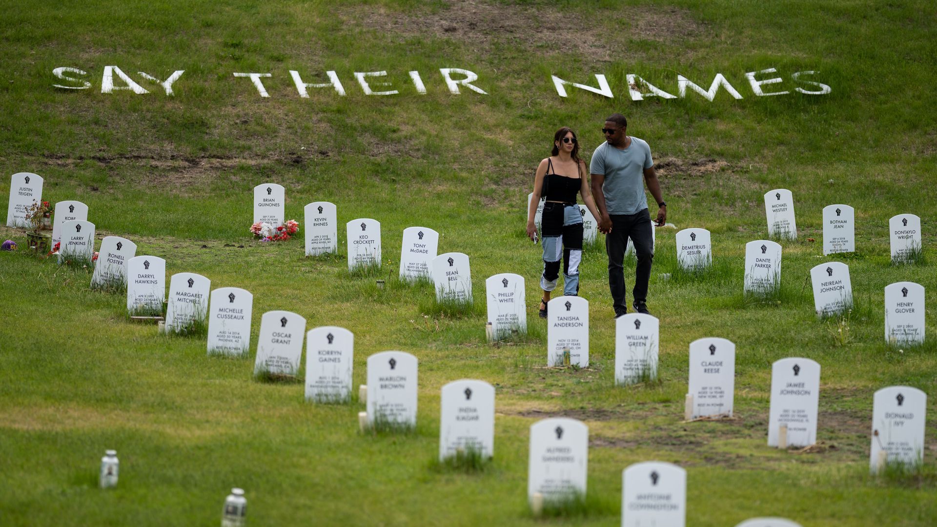 People visit Say Their Names cemetery near George Floyd Square, on Saturday, May 22, 2021 in Minneapolis, MN. (Kent Nishimura / Los Angeles Times via Getty Images)