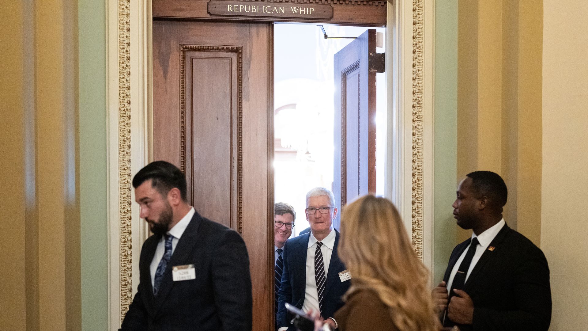 Apple CEO Tim Cook on Capitol Hill, leaving a senator's office