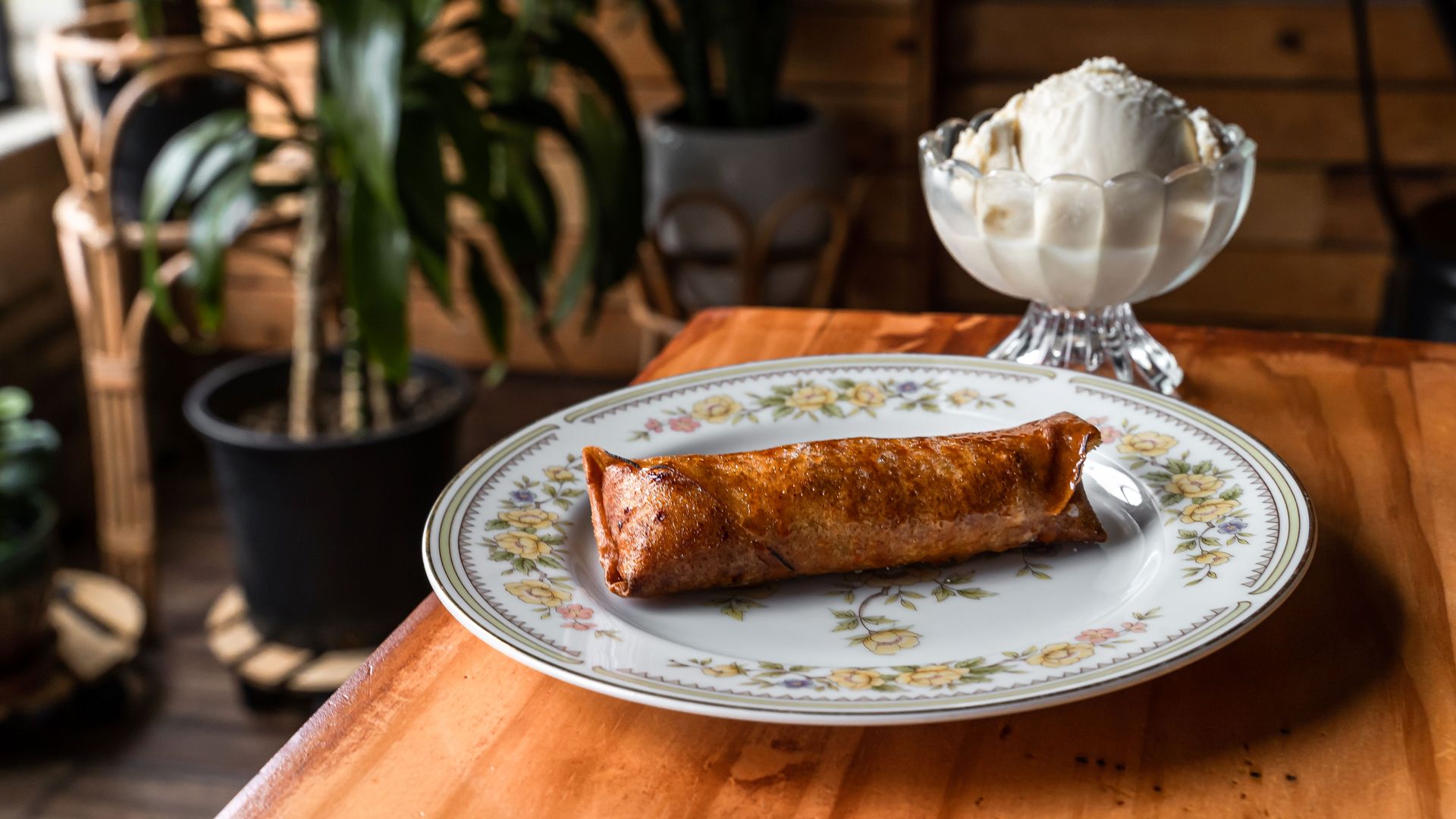 Photo of food on a plate and ice cream in a bowl 
