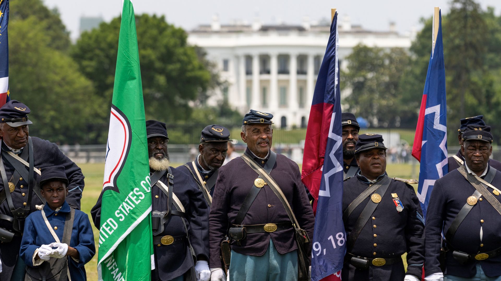 Members of a Civil War re-enactment troop are seen with the White House in the background during Juneteenth celebrations in Washington, D.C., the United States, on June 19, 2023.