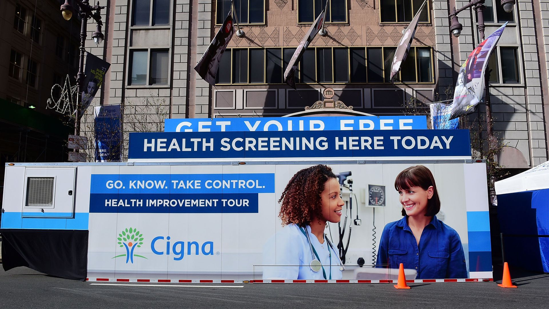 A mobile van sponsored by Cigna promotes free health screenings.