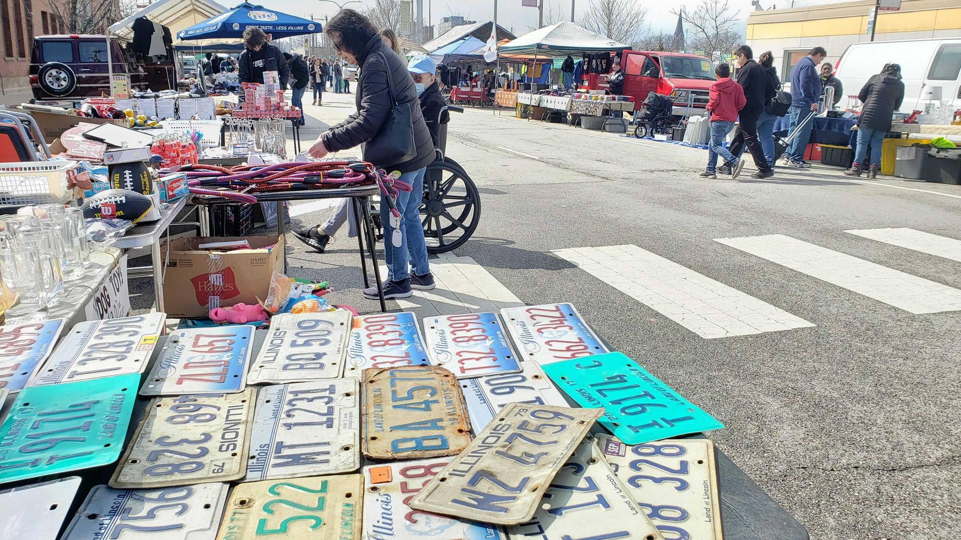 Junk on a table at a market. 