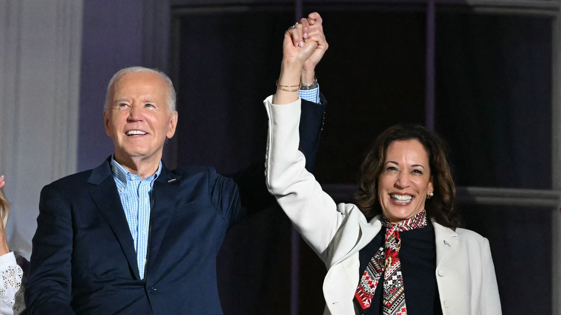 President Biden and Vice President Harris watch fireworks from the Truman Balcony of the White House on Thursday night.