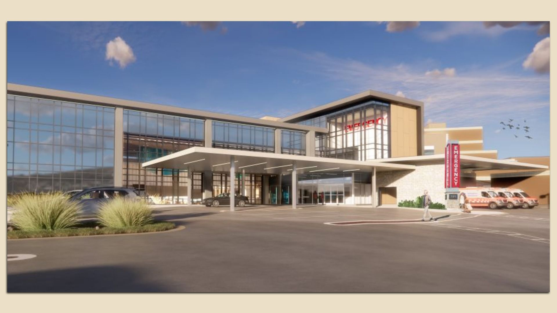 Rendering of a modern hospital exterior with a glass facade, a covered entrance, a vertical red emergency sign, ambulances parked at the curb, and pedestrians under a blue sky.