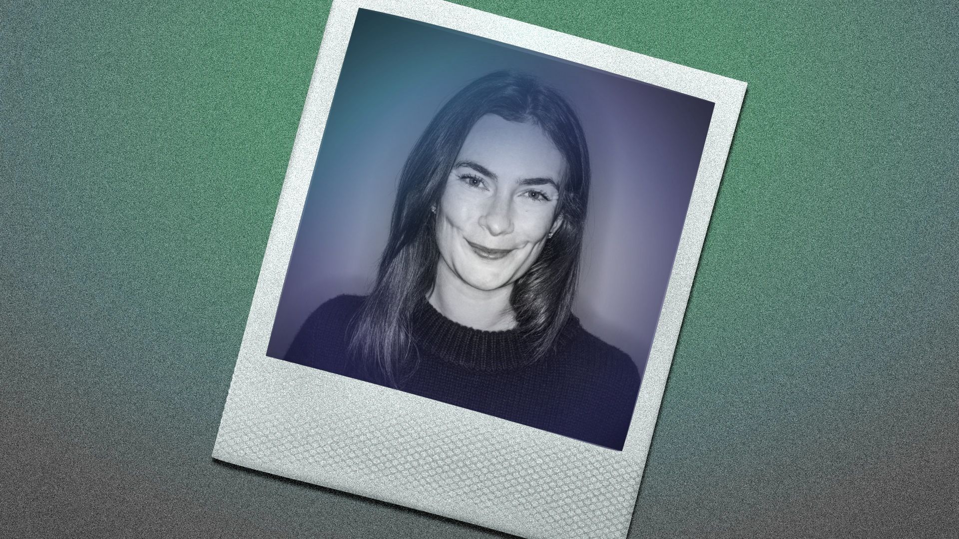Polaroid-style photo tilted on a textured green background with a white border, showing a smiling woman with shoulder-length dark hair wearing a dark sweater.