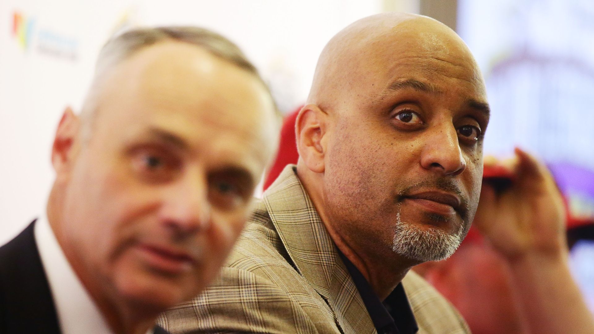   MLB COO Robert Manfred (L) and MLBPA Executive Director Tony Clark (R) attend the MLB Welcome to Australia Press Conference at Sydney Cricket Ground on March 18, 2014 in Sydney, Australia.