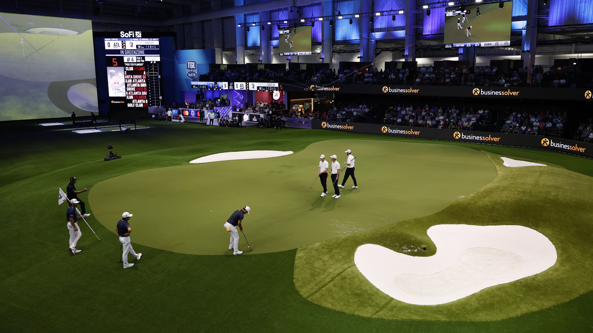 Xander Schauffele putts during a TGL match at SoFi Center in March. 