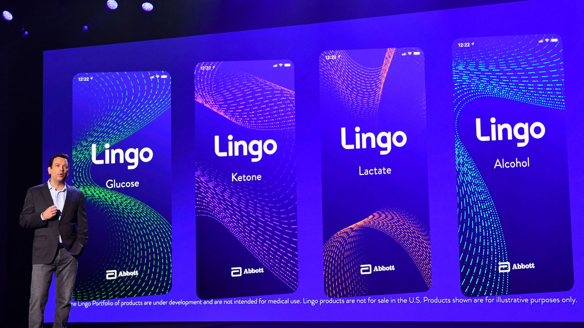 Robert Ford, chairman and chief executive officer of Abbott Laboratories, unveils a portfolio of Lingo biosensors for health monitoring during the company's keynote at the Consumer Electronics Show (CES) on January 6, 2022 in Las Vegas, Nevada. (Photo by Patrick T. FALLON / AFP) (Photo by PATRICK T.