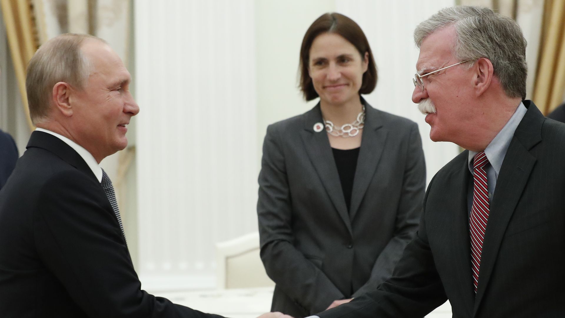 Russian President Vladimir Putin shakes hands with John Bolton, National Security Adviser to the US President, during a meeting at the Kremlin in Moscow on October 23, 2018.