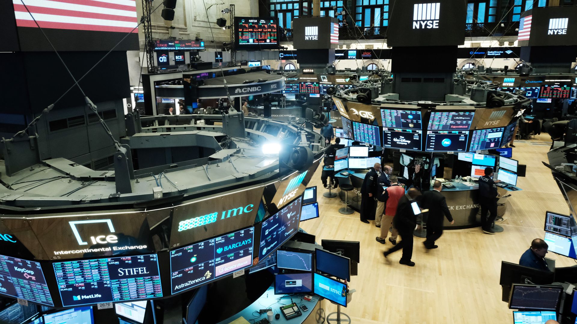 Traders work on the floor of the New York Stock Exchange