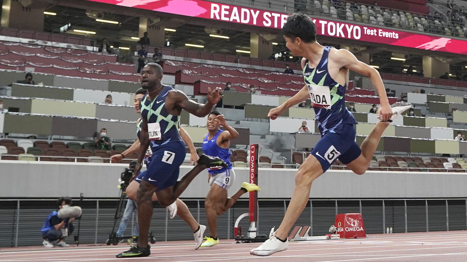 Justin Gatlin (2nd L) of the US wins the Men's 100m final , part of the World Athletics Continental Tour at the National Stadium on May 09, 2021 in Tokyo, Japan.