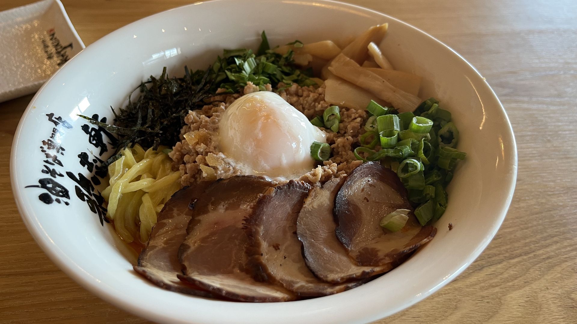 A photo of a bowl of aburasoba 