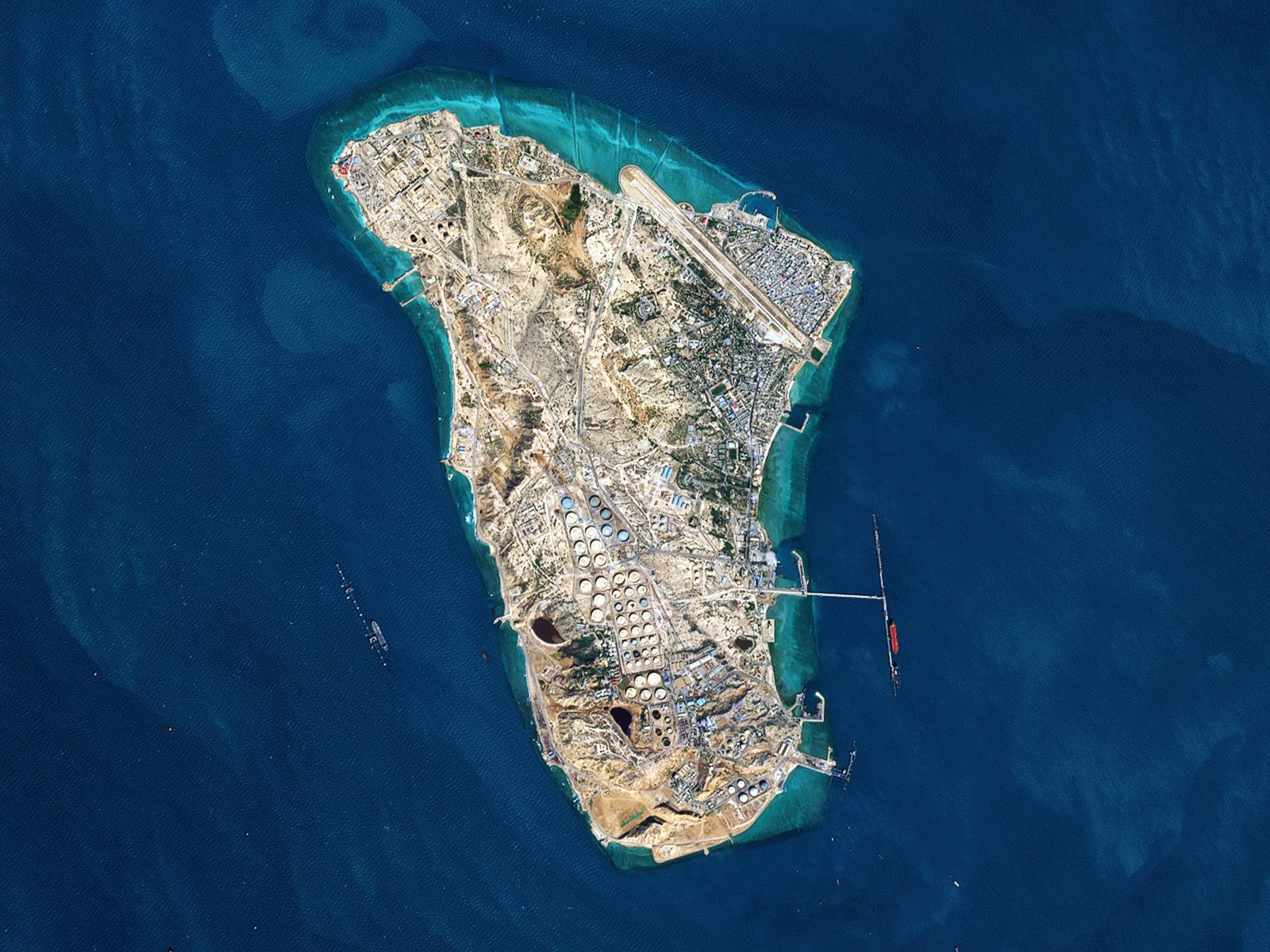 Aerial view of Kharg Island in the Persian Gulf, showing the Iranian island’s coastline and surrounding waters.