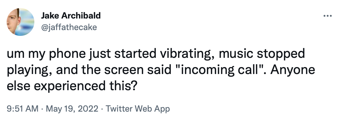 A tweet describing receiving a phone call as if it were a weird glitch