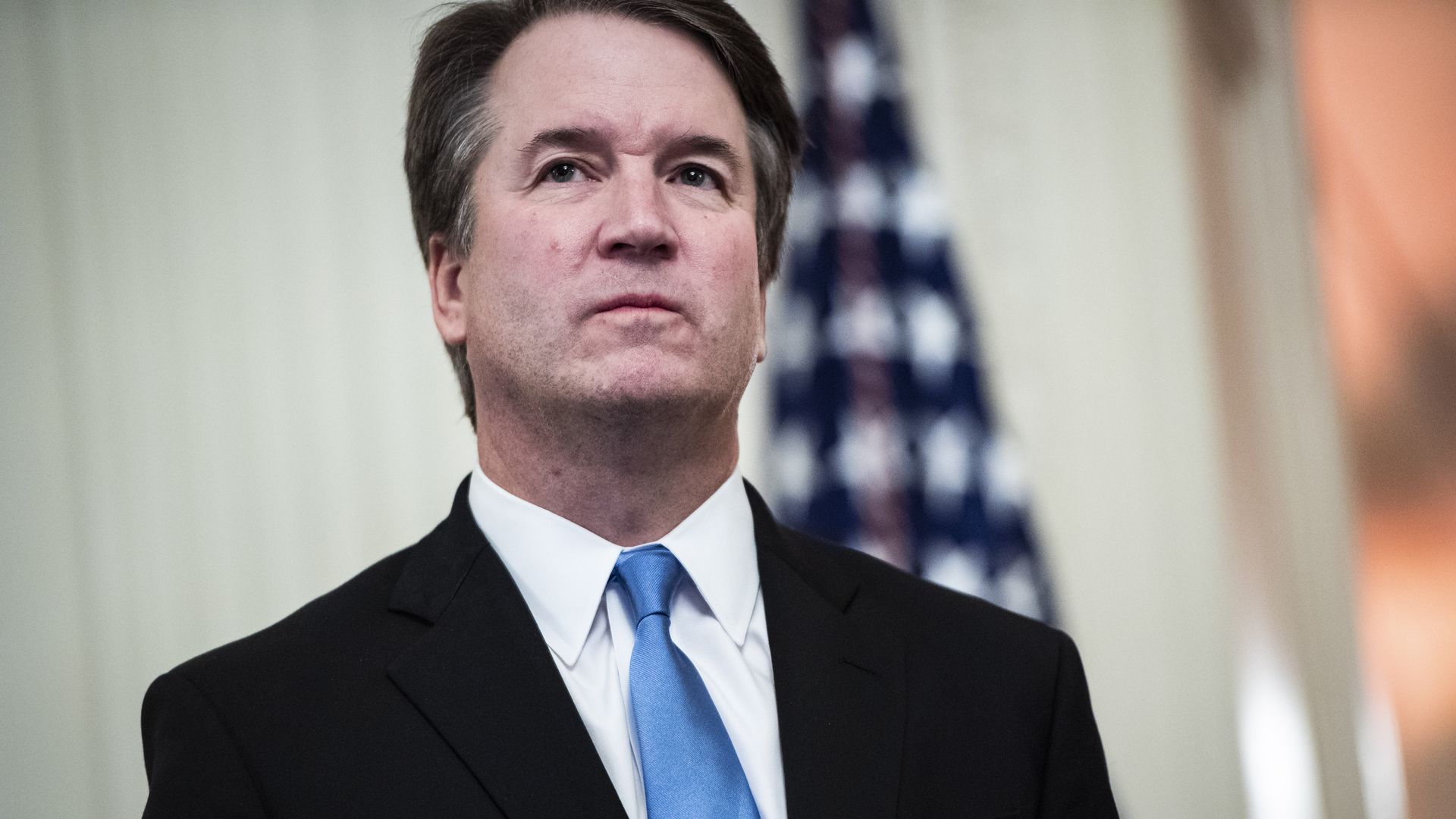 Associate Justice Brett Kavanaugh listens as President Donald J. Trump speaks during a swearing-in ceremony in the East Room of the White House on Oct. 8, 2018 in Washington, DC.
