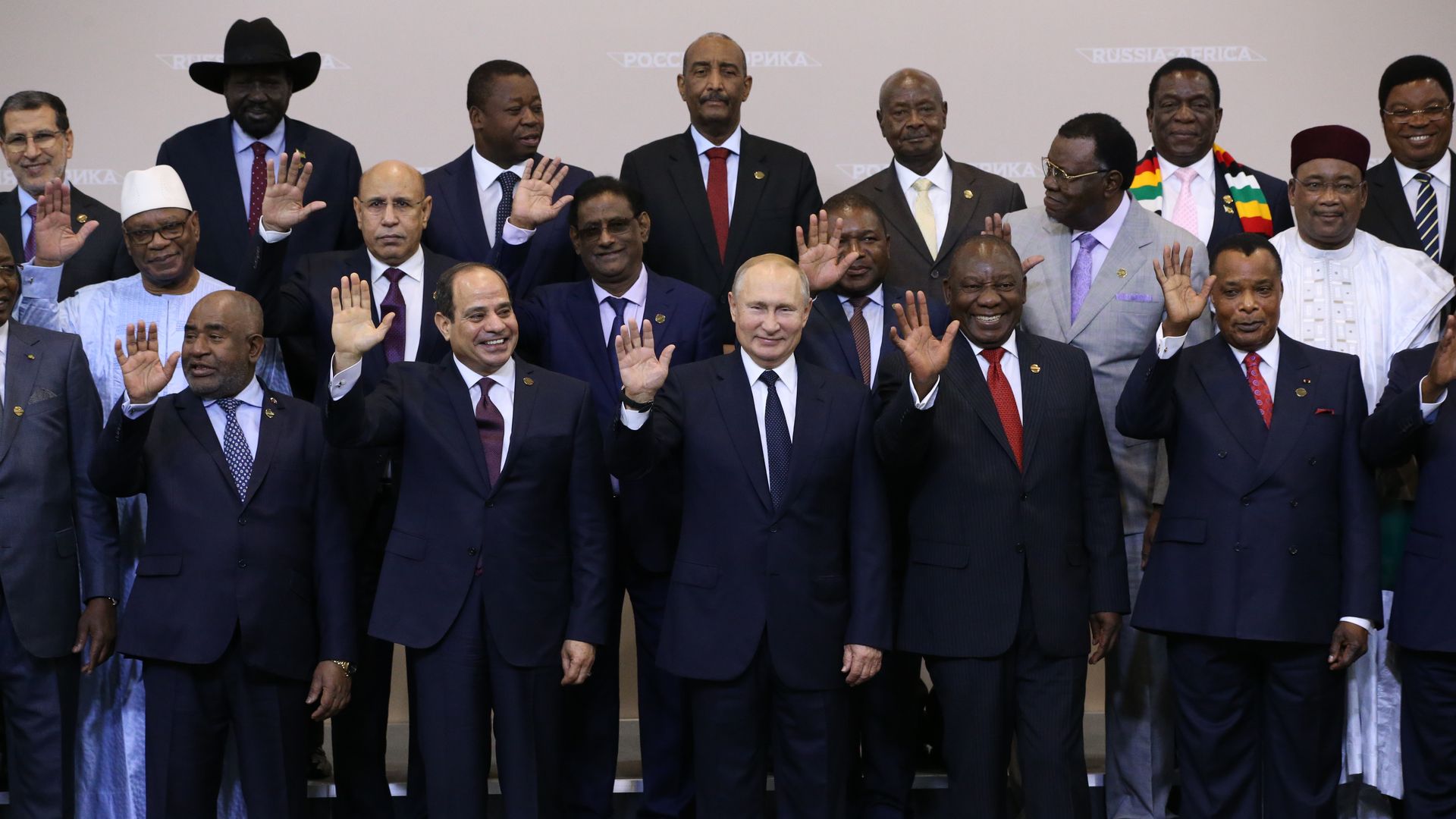Putin and African leaders gathered and waving