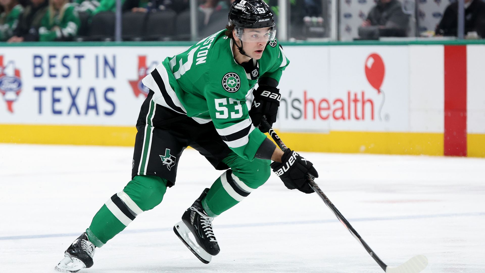 Dallas Stars player Wyatt Johnston skates with the puck
