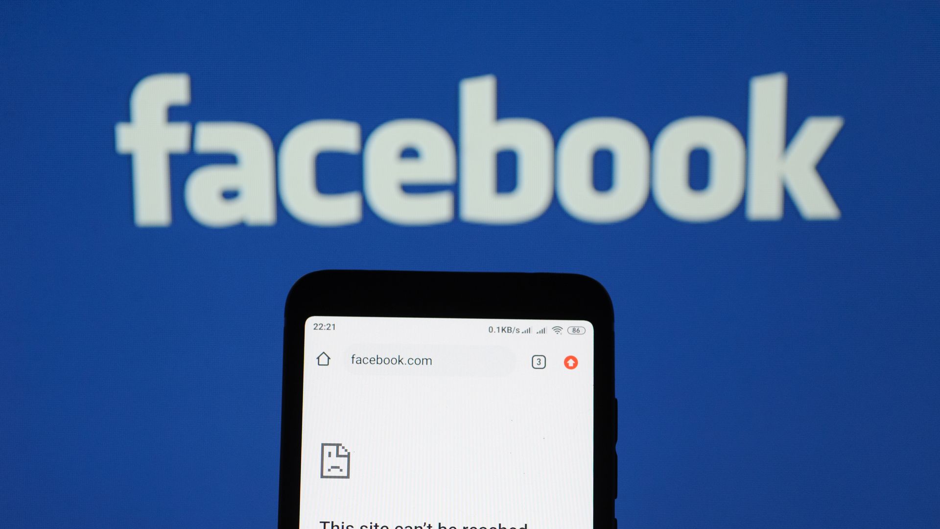 The Facebook logo with a phone struggling to reach the website