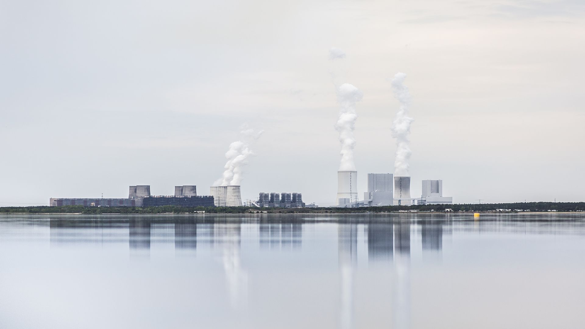 Smoke rises from stacks